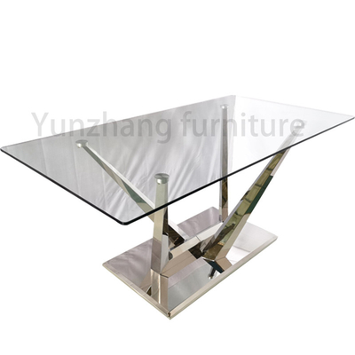 Table à manger en argent avec verre transparent