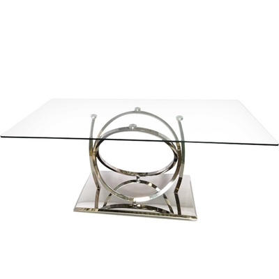 Table de salle à manger argentée de luxe en métal avec le verre clair pour la salle à manger