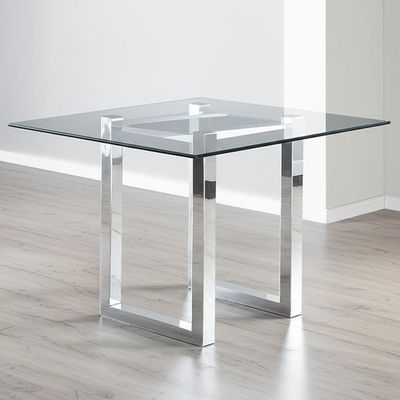 Table à manger en argent avec verre transparent