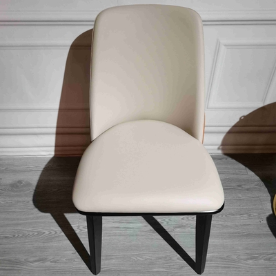 Le dossier dinant moderne à extrémité élevé à la maison de cuir de chaises en bois solide a capitonné des chaises de salle à manger