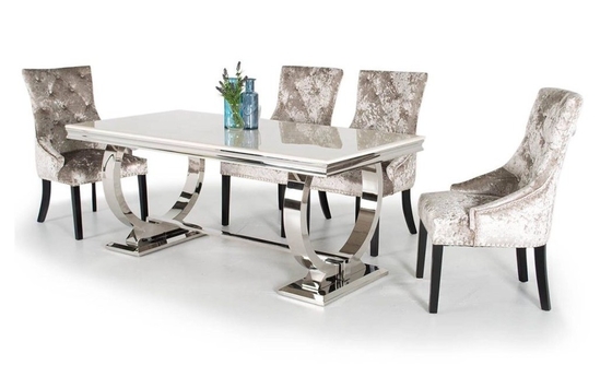 La table de salle à manger argentée de jambe d'acier inoxydable d'or a placé 6 Seater avec le dessus de marbre
