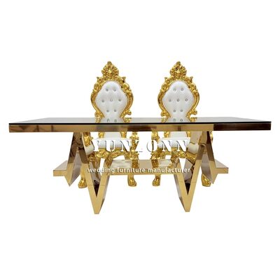 Bon prix Table de mariage de gros mobilier de luxe moderne en acier inoxydable doré table de salle à manger en verre 6 chaises en ligne