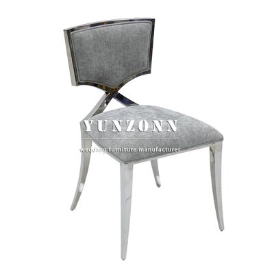 Bon prix Conception spéciale Hôtel Banquet Meubles Chaise en acier inoxydable Cadre argenté Chaise d'événement de soirée en ligne