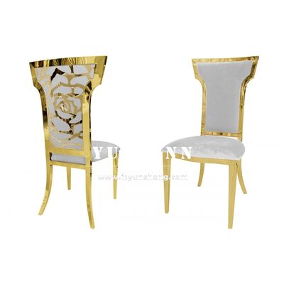 Bon prix Chaise de banquet de mariage en métal doré avec dossier à motif floral, chaise de salle à manger de banquet de luxe moderne en ligne