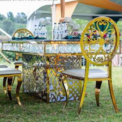 Bon prix Hôtel de luxe Table de salle à manger en verre doré avec pendentif en cristal en acier inoxydable pour banquets, restaurants et fêtes en ligne