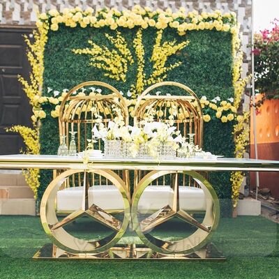 Bon prix Table à manger de mariage en acier inoxydable de style moderne Nouveau mobilier d'hôtel en plein air avec verre et MDF pour les fêtes et les événements en ligne